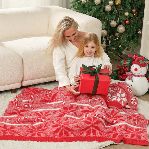 Snuggle Sac blanket next to throw pillow for scale and practical sizing