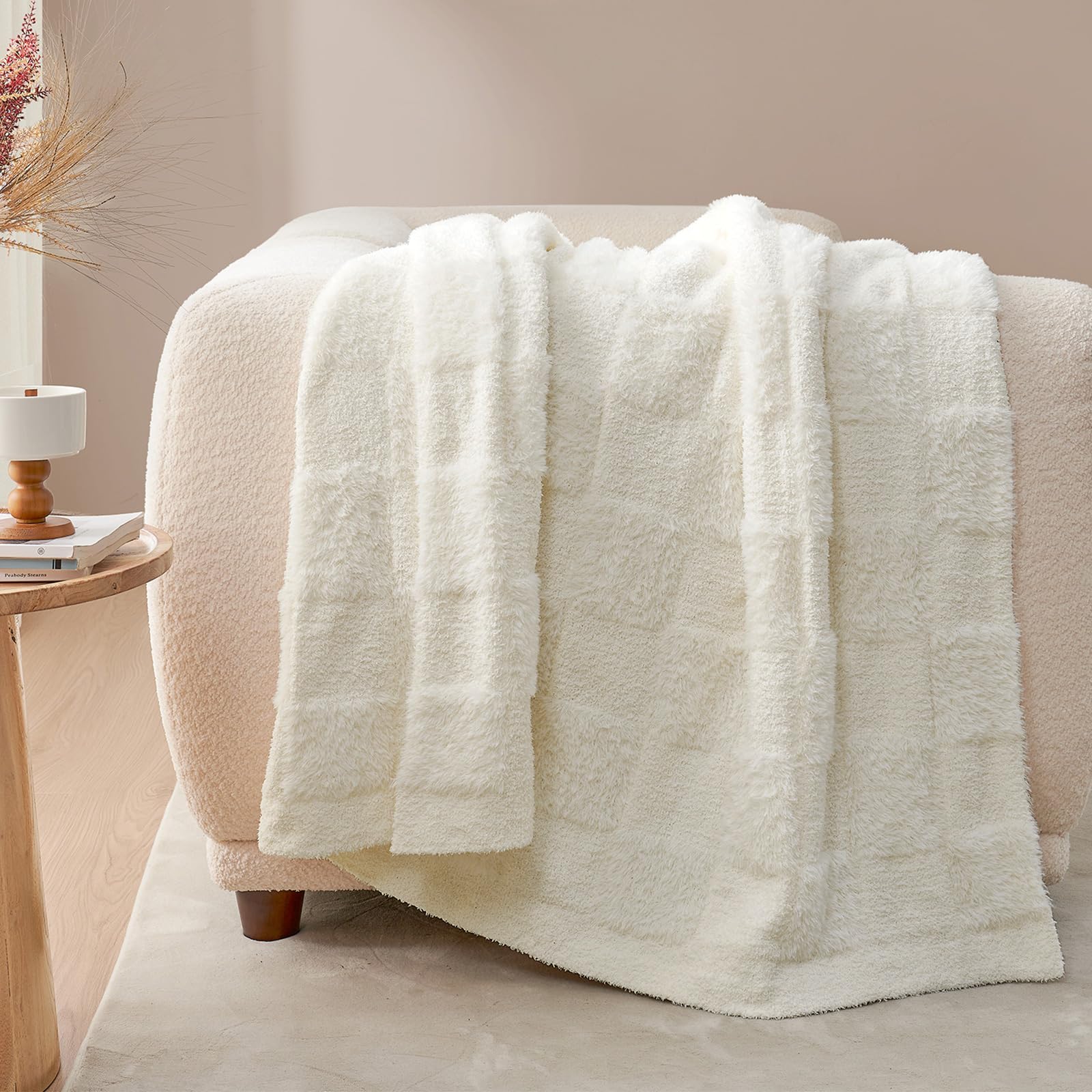 Snuggle Sac throw on bench to show 50x60 size for scale and portability