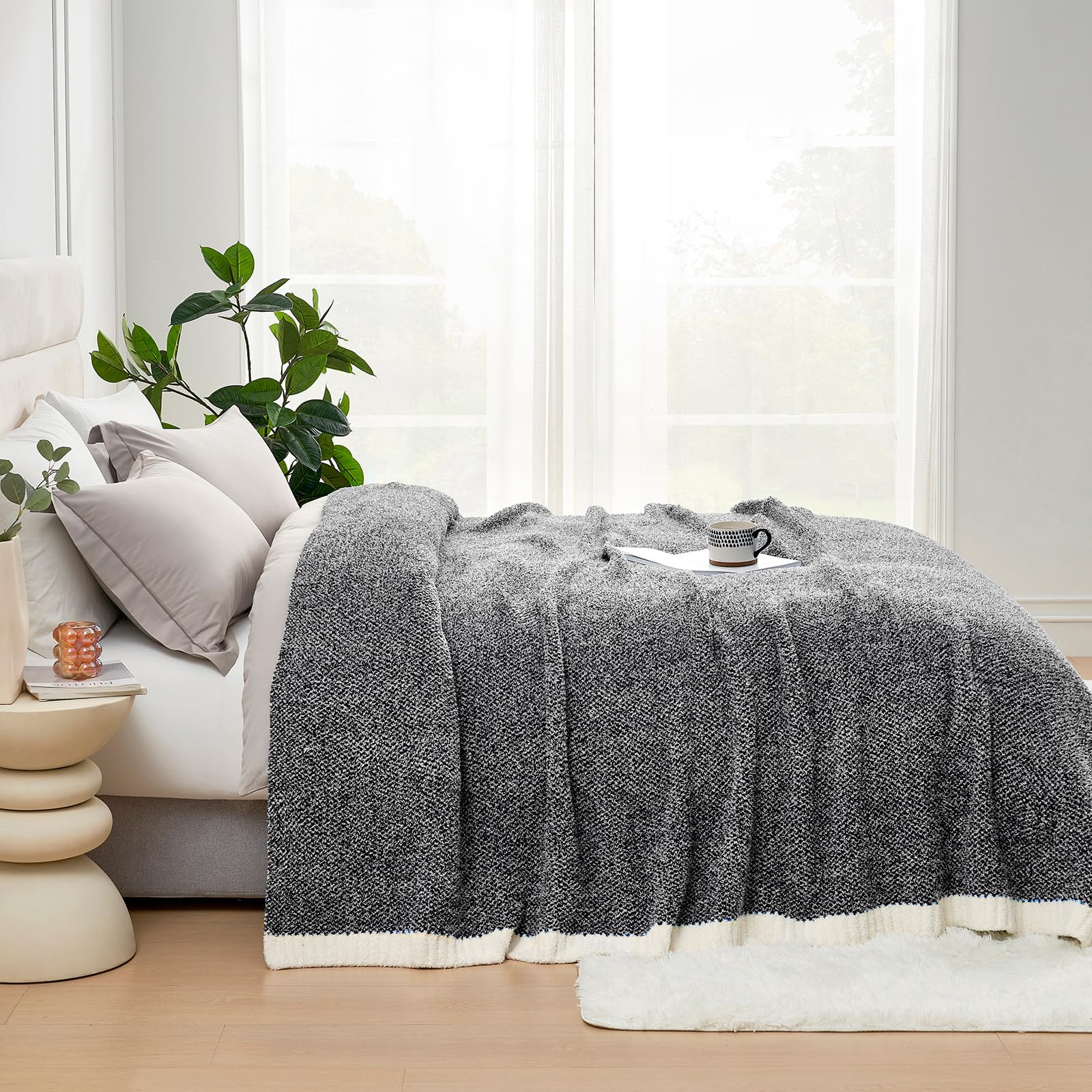 Snuggle Sac throw draped on sofa providing cozy living room warmth