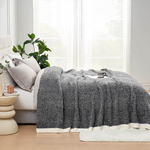 Snuggle Sac throw draped on sofa providing cozy living room warmth