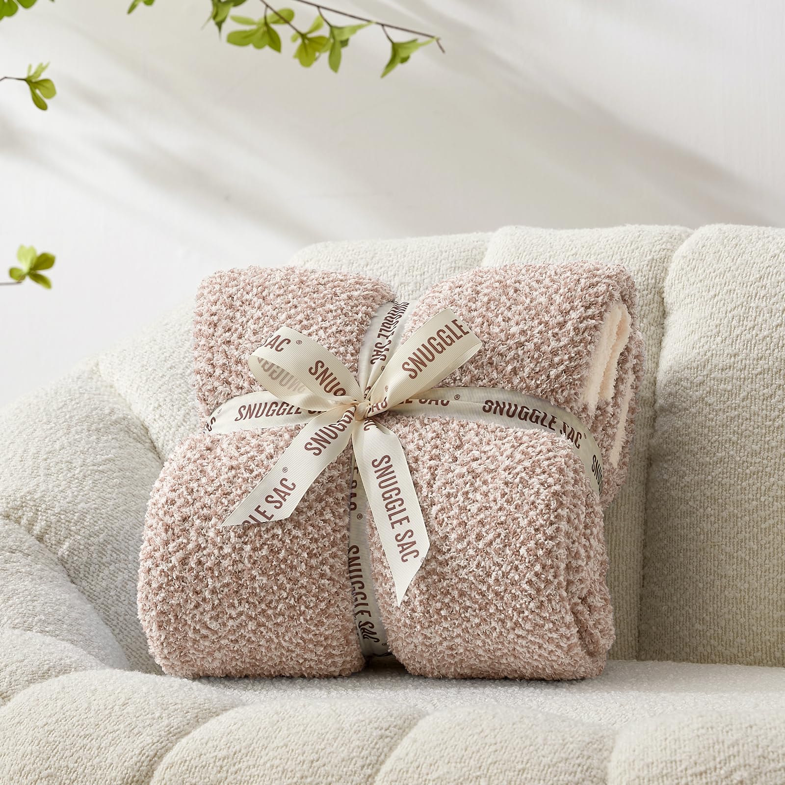 Snuggle Sac throw draped on sofa showing style and comfort