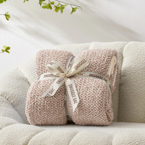 Snuggle Sac throw draped on sofa showing style and comfort