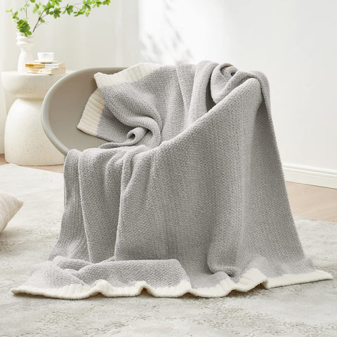 Snuggle Sac throw draped on sofa benefit: adds warmth and style