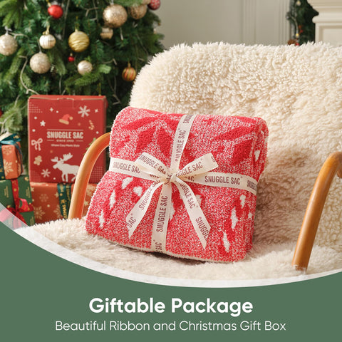 Snuggle Sac throw draped on sofa creating a warm, inviting holiday atmosphere