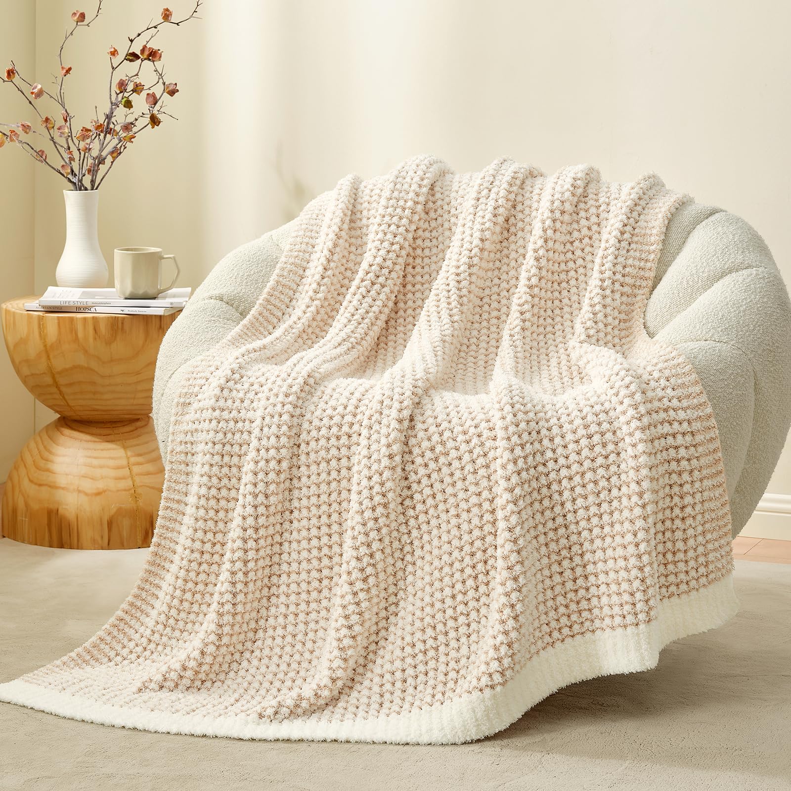 Snuggle Sac front view showing cream waffle throw and cozy appeal