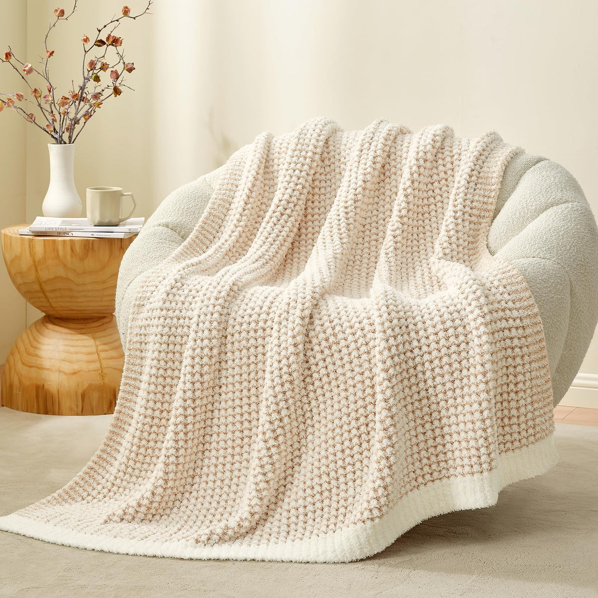 Snuggle Sac front view showing cream waffle throw and cozy appeal