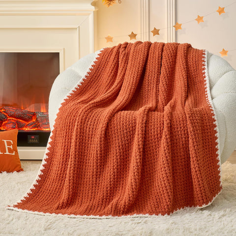 Snuggle Sac front view of orange waffle throw showing full blanket and edges; cozy accent