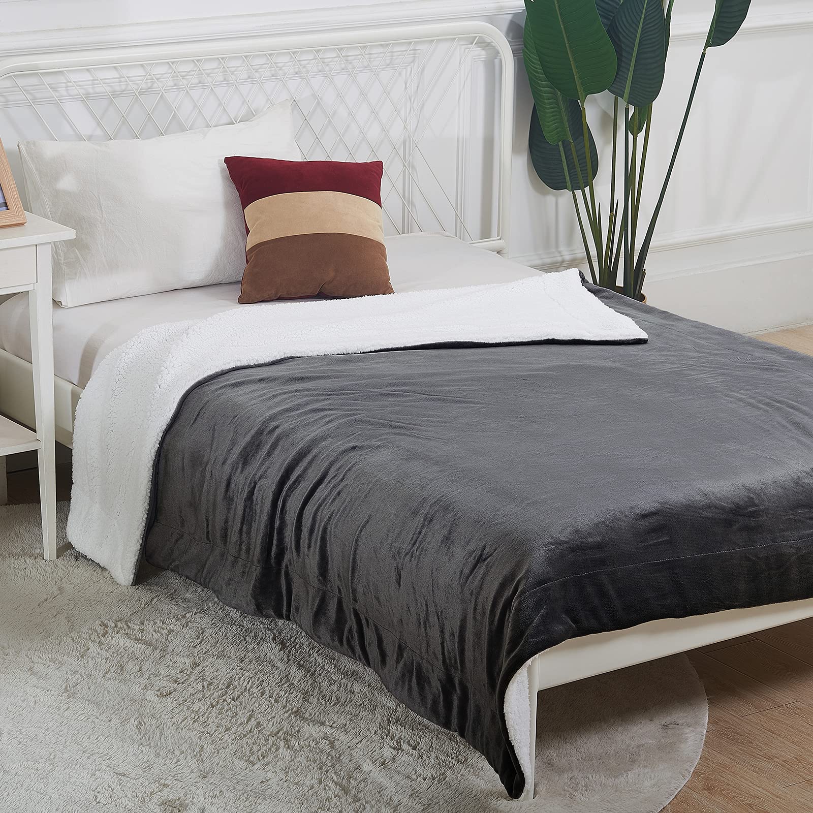 SOCHOW size comparison on twin bed showing blanket coverage and generous dimensions
