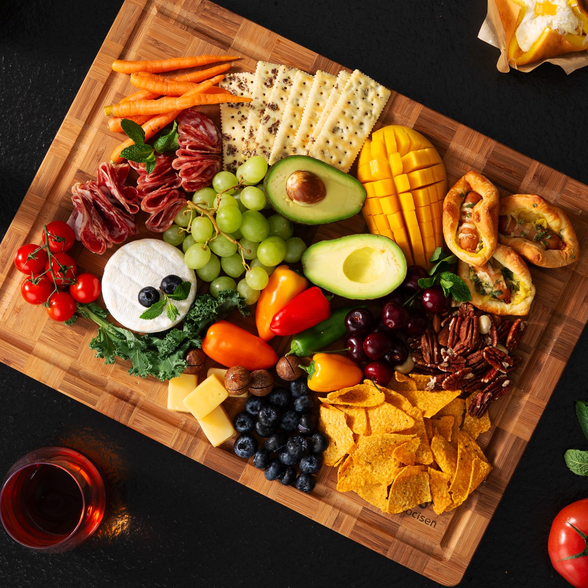 Socisen board next to chef knife illustrating scale and knife-friendly surface