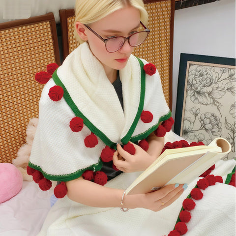 SoffMoiis blanket next to hand showing 40-inch size scale