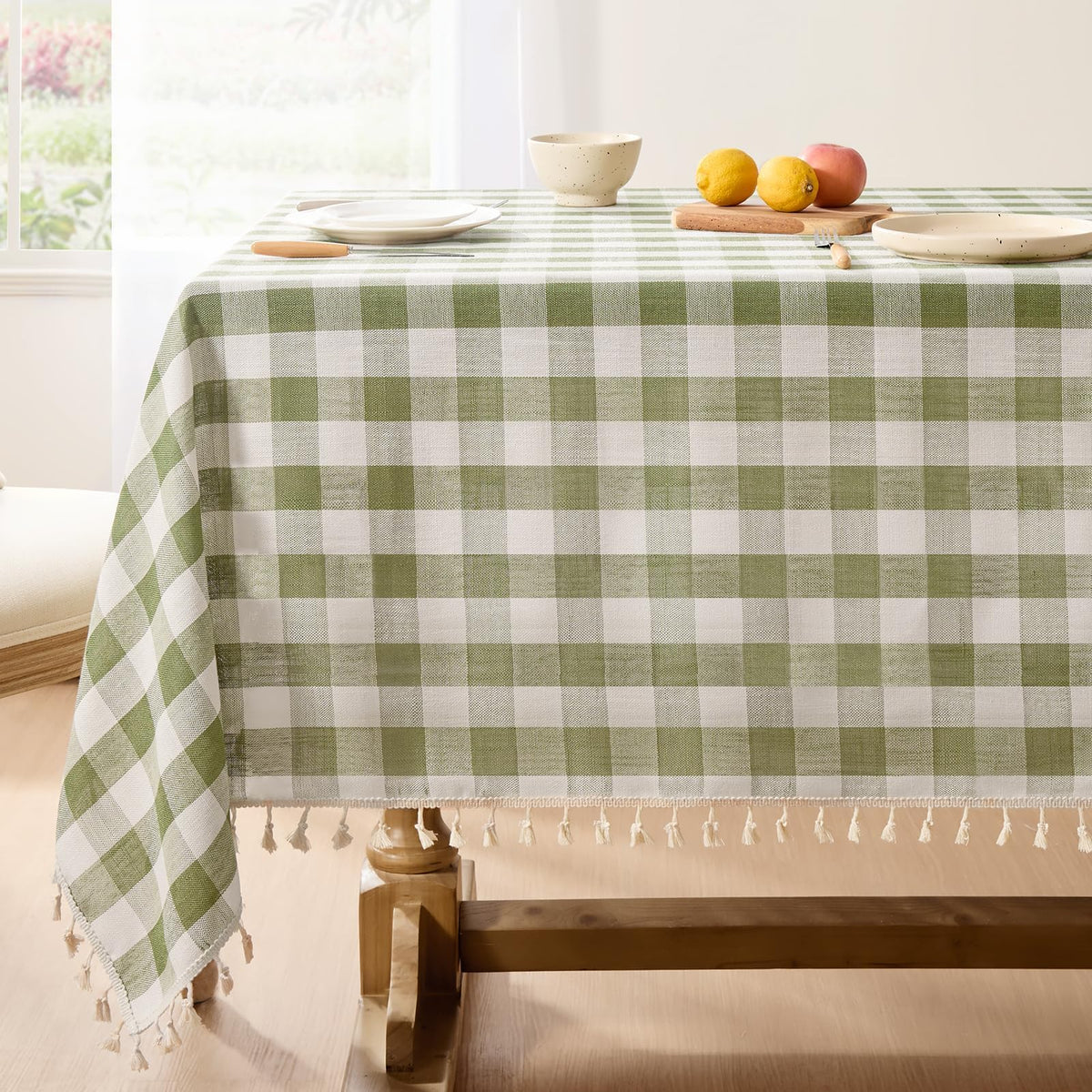 Softalker front view of sage gingham tablecloth on folded display, shows color and finish