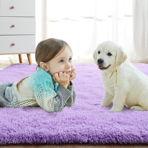Softlife rug next to chair showing 4x5.3 feet scale and fit