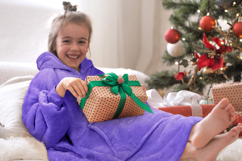 Family movie night with Solaris hoodie showing shared warmth and relaxed fun