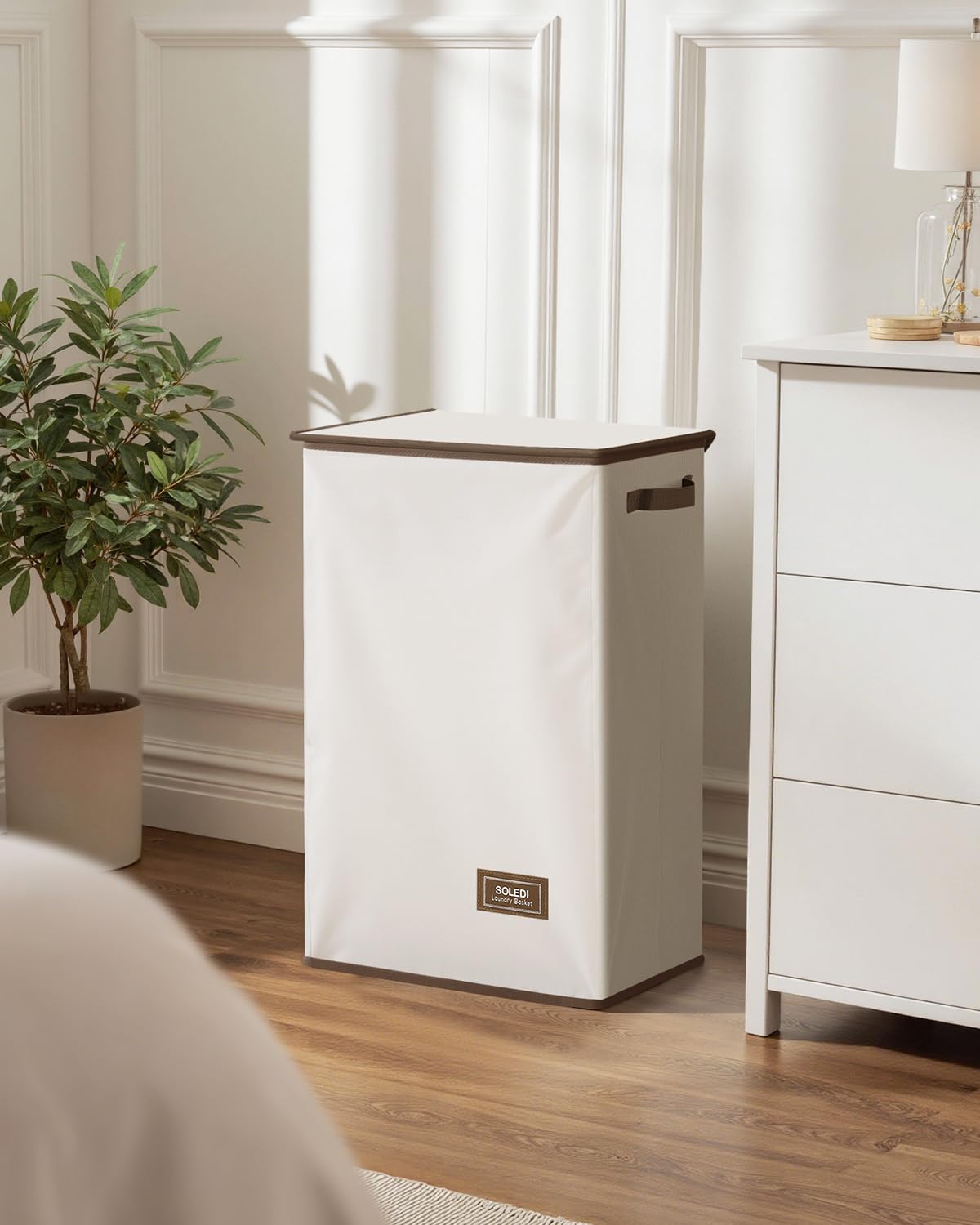 SOLEDI placed in RV showing portable laundry storage advantage
