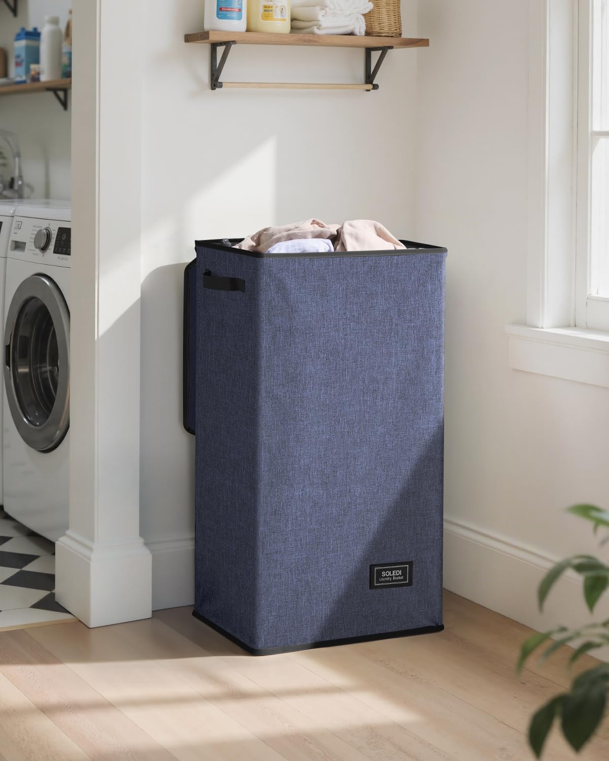SOLEDI laundry hamper with lid closed keeping clothes concealed and tidy