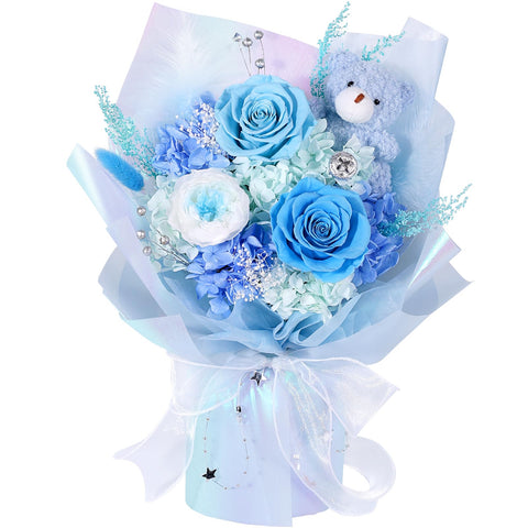 SOLUNOX front view of packaged blue preserved bouquet showing gift-ready presentation