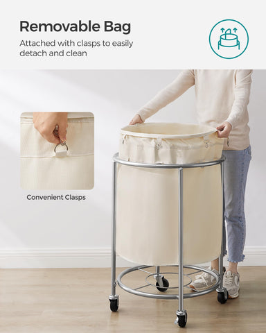 SONGMICS laundry basket in hallway demonstrating space-saving mobility