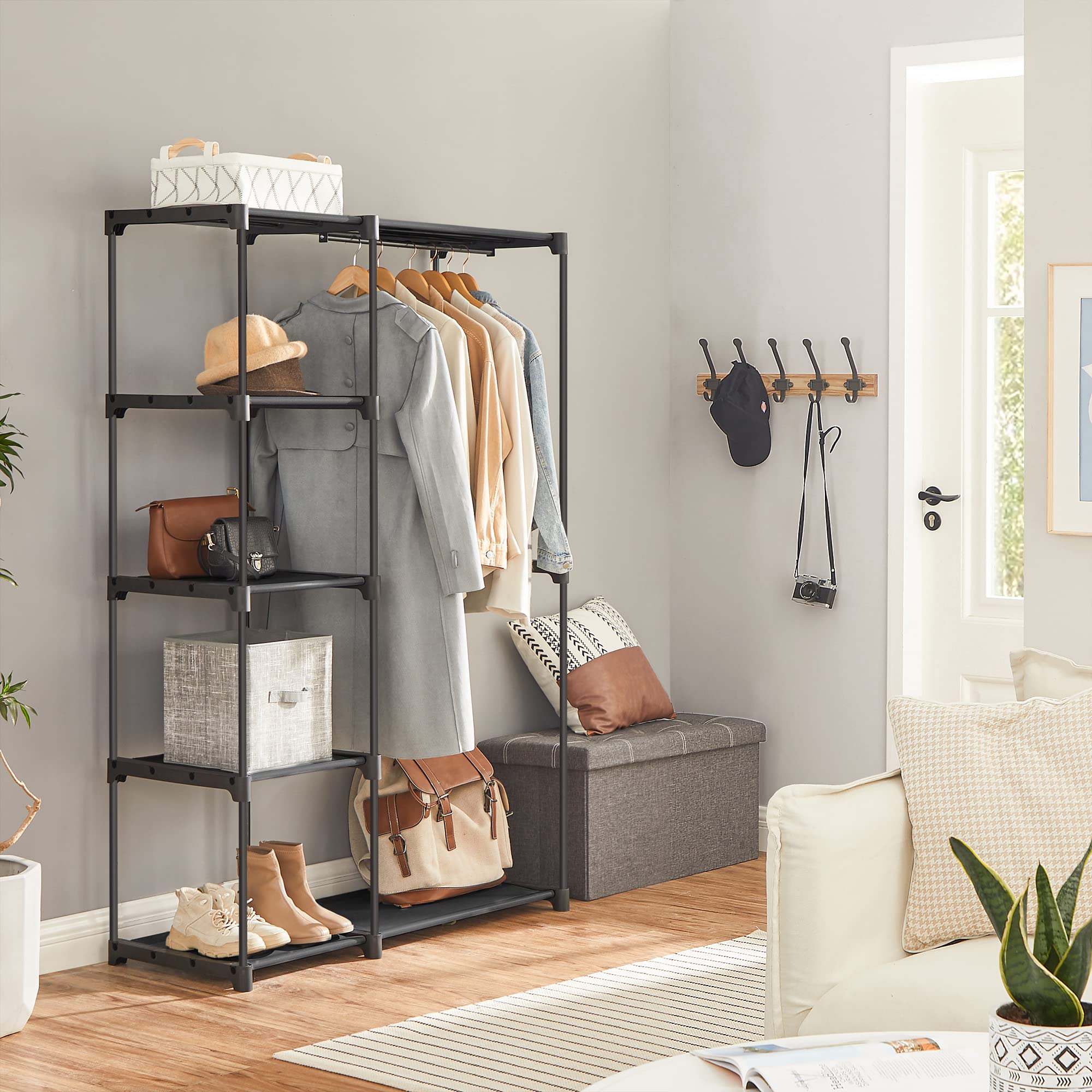 SONGMICS fabric shelf detail showing breathable shelf material for folded clothes