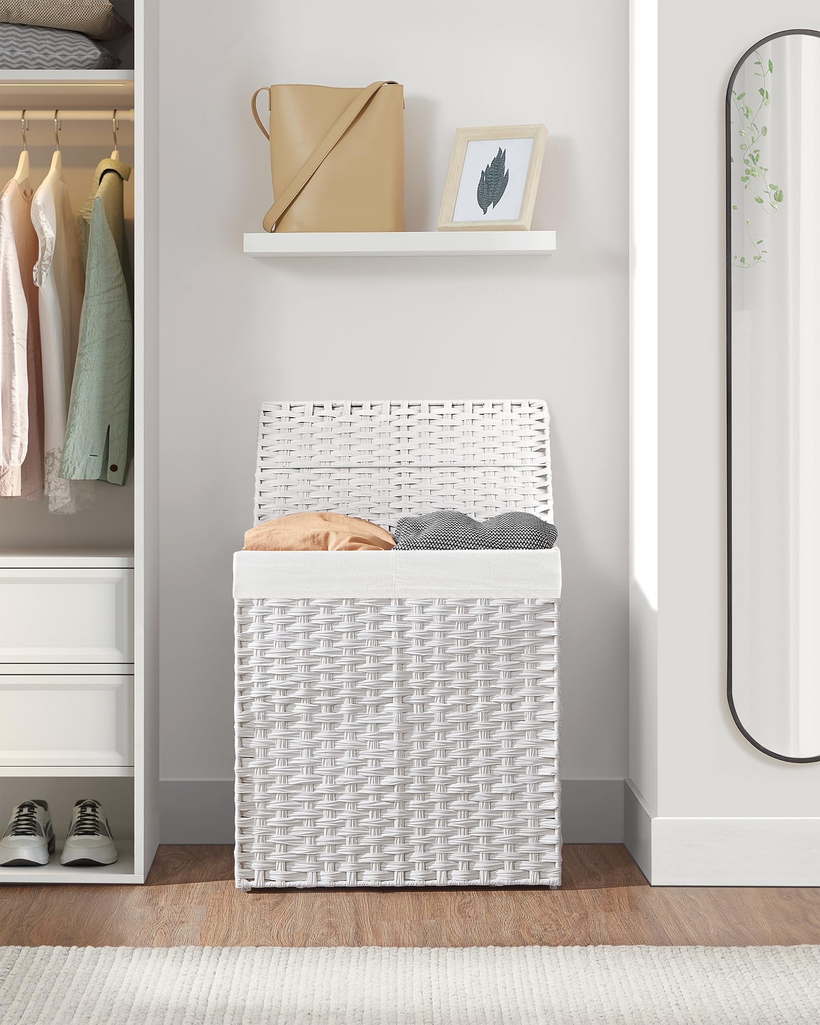 SONGMICS full hamper demonstrating large 110L capacity benefit