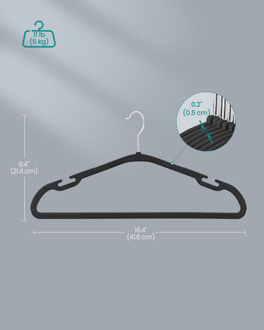 SONGMICS hangers holding mixed garments in a tidy organized closet