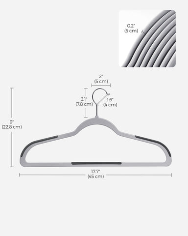 SONGMICS hangers next to ruler for size and thin 0.2 inch space-saving comparison