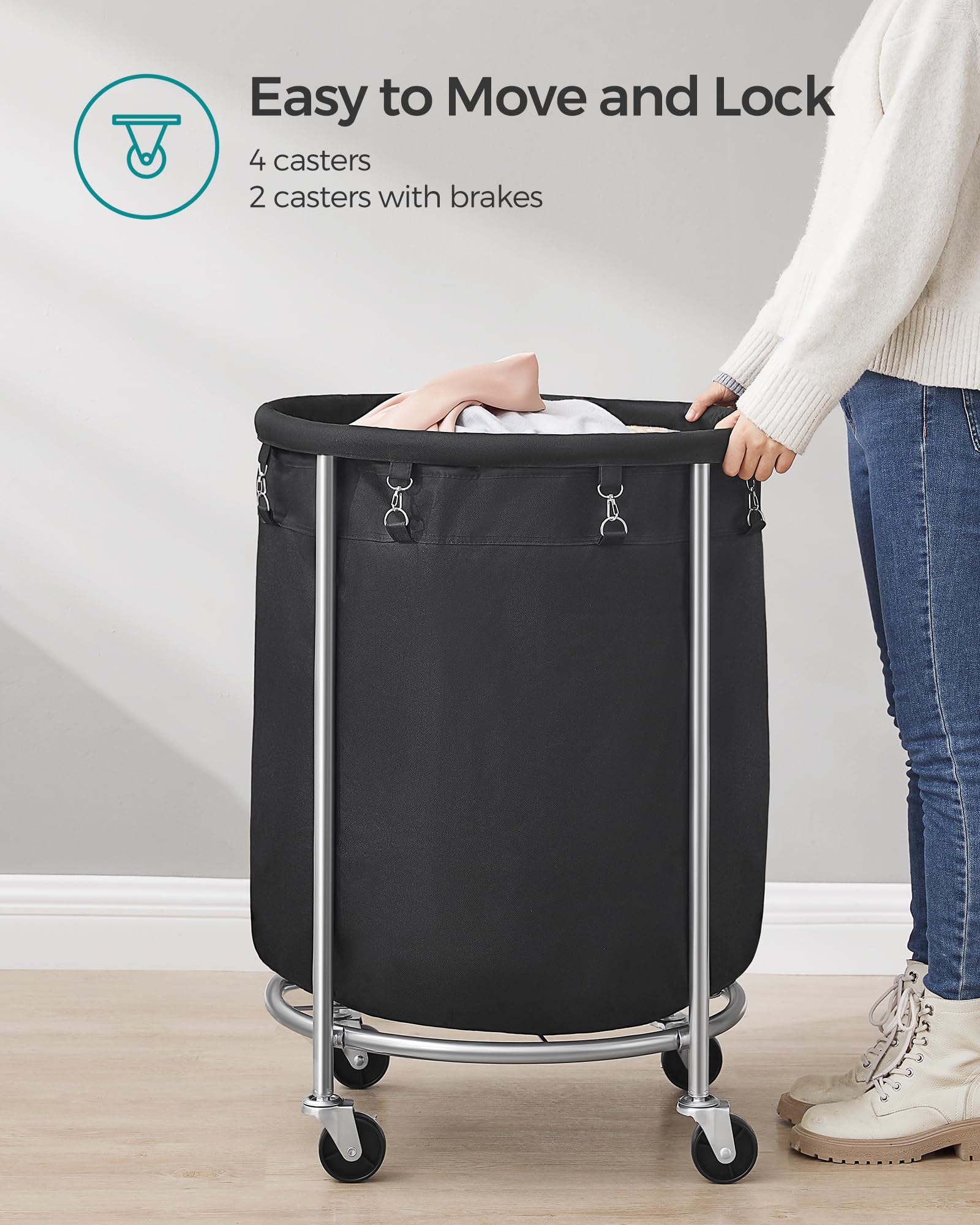 SONGMICS packed with bed linen to show large 190L capacity for sheets and towels