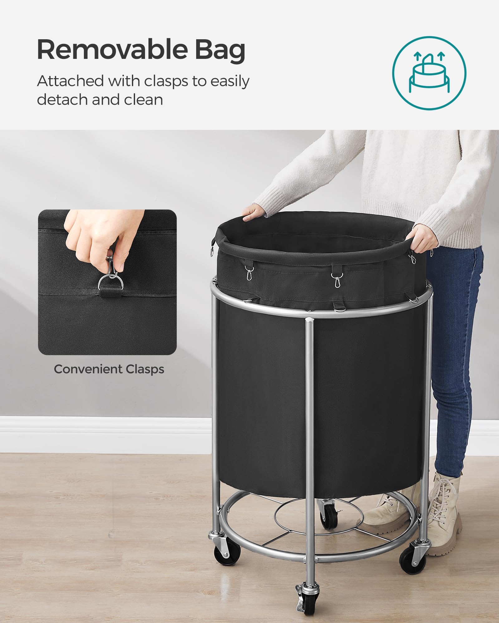 SONGMICS basket next to chair to show scale and how much laundry it can hold