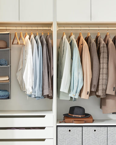 SONGMICS hangers styled in a bedroom wardrobe showing an organized, boutique-like display