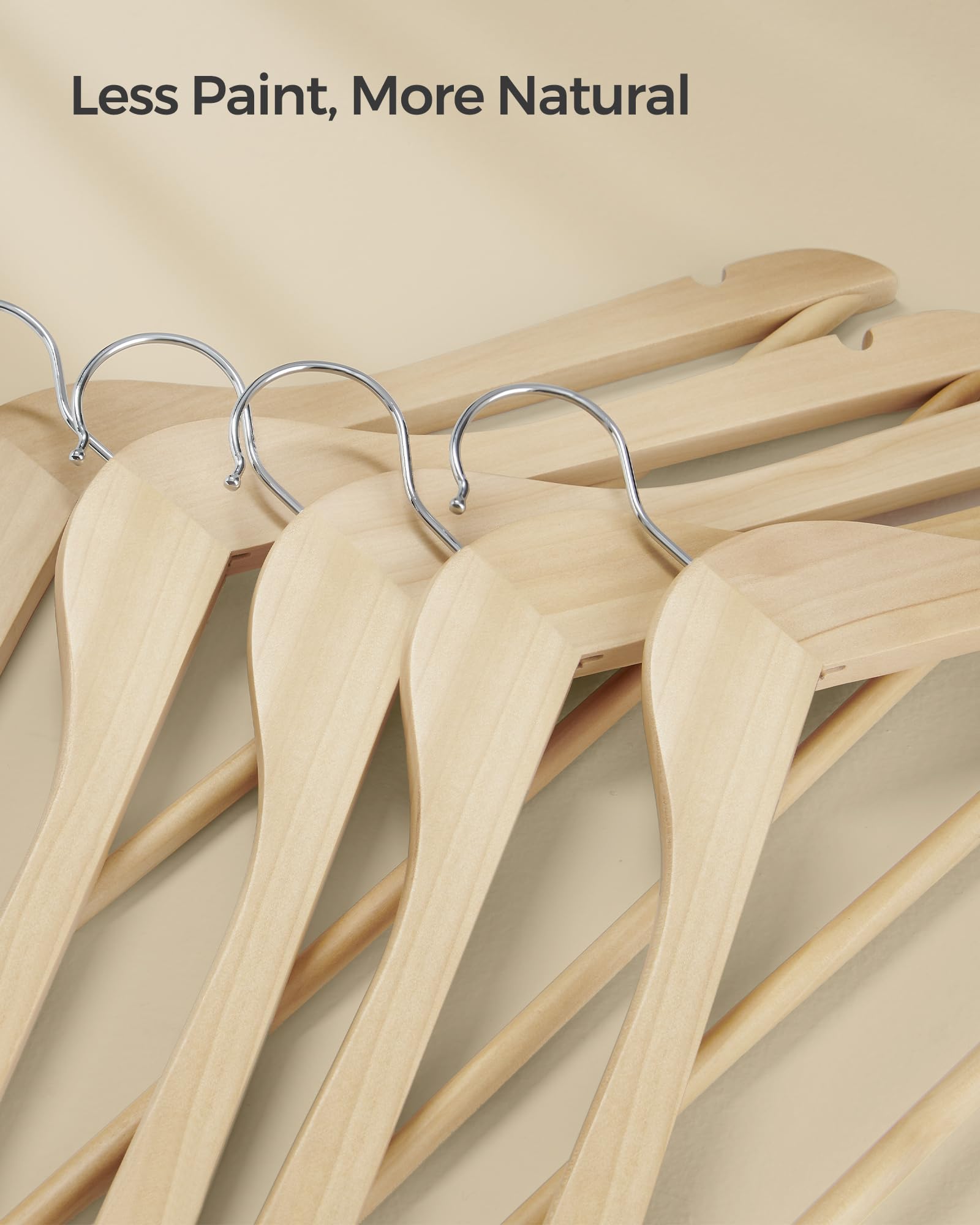 SONGMICS styled closet with wooden hangers creating tidy visual appeal