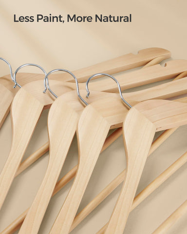SONGMICS styled closet with wooden hangers creating tidy visual appeal