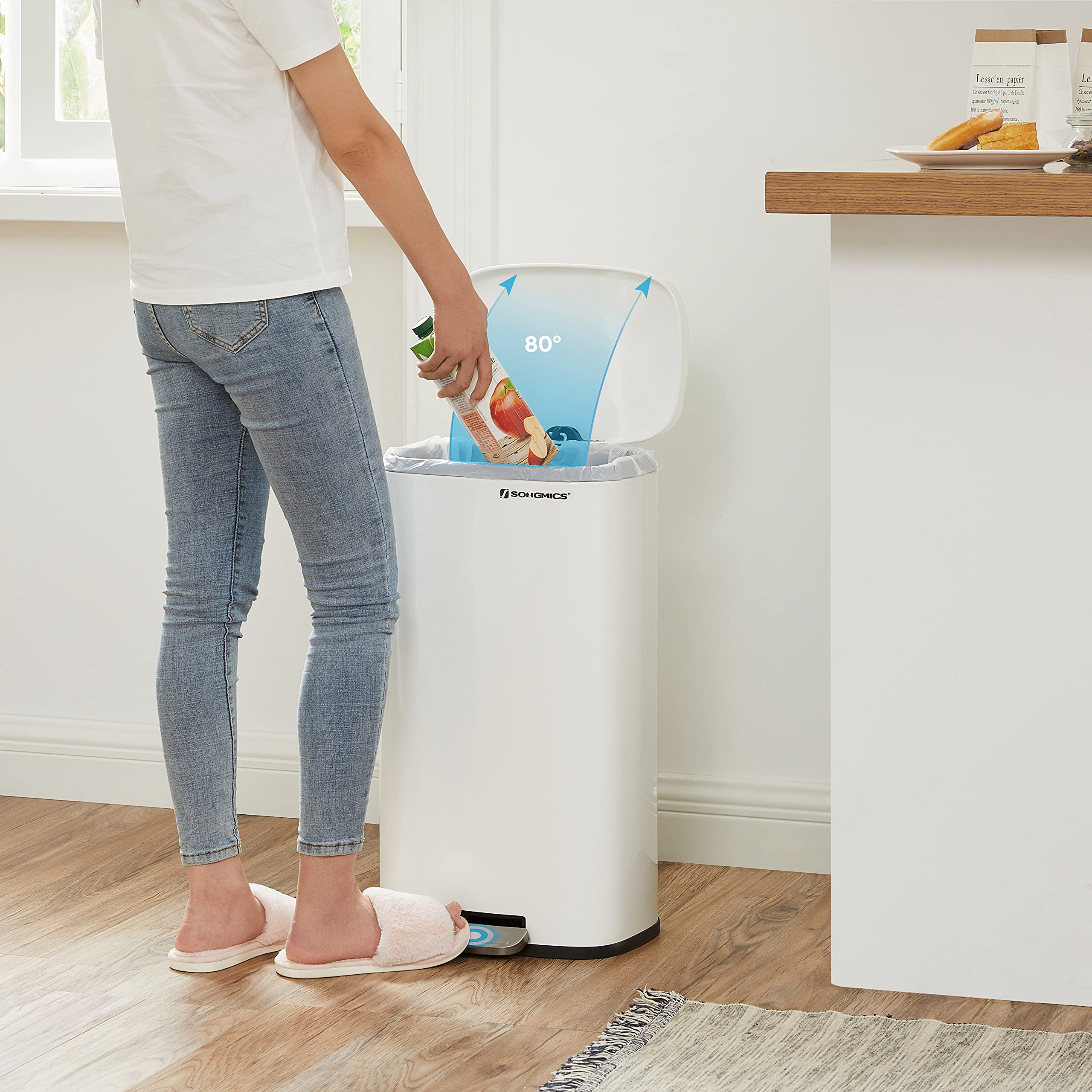 SONGMICS foot pedal being pressed demonstrating hands-free convenience and hygienic use