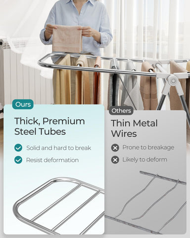 SONGMICS scale comparison with towels to demonstrate load capacity
