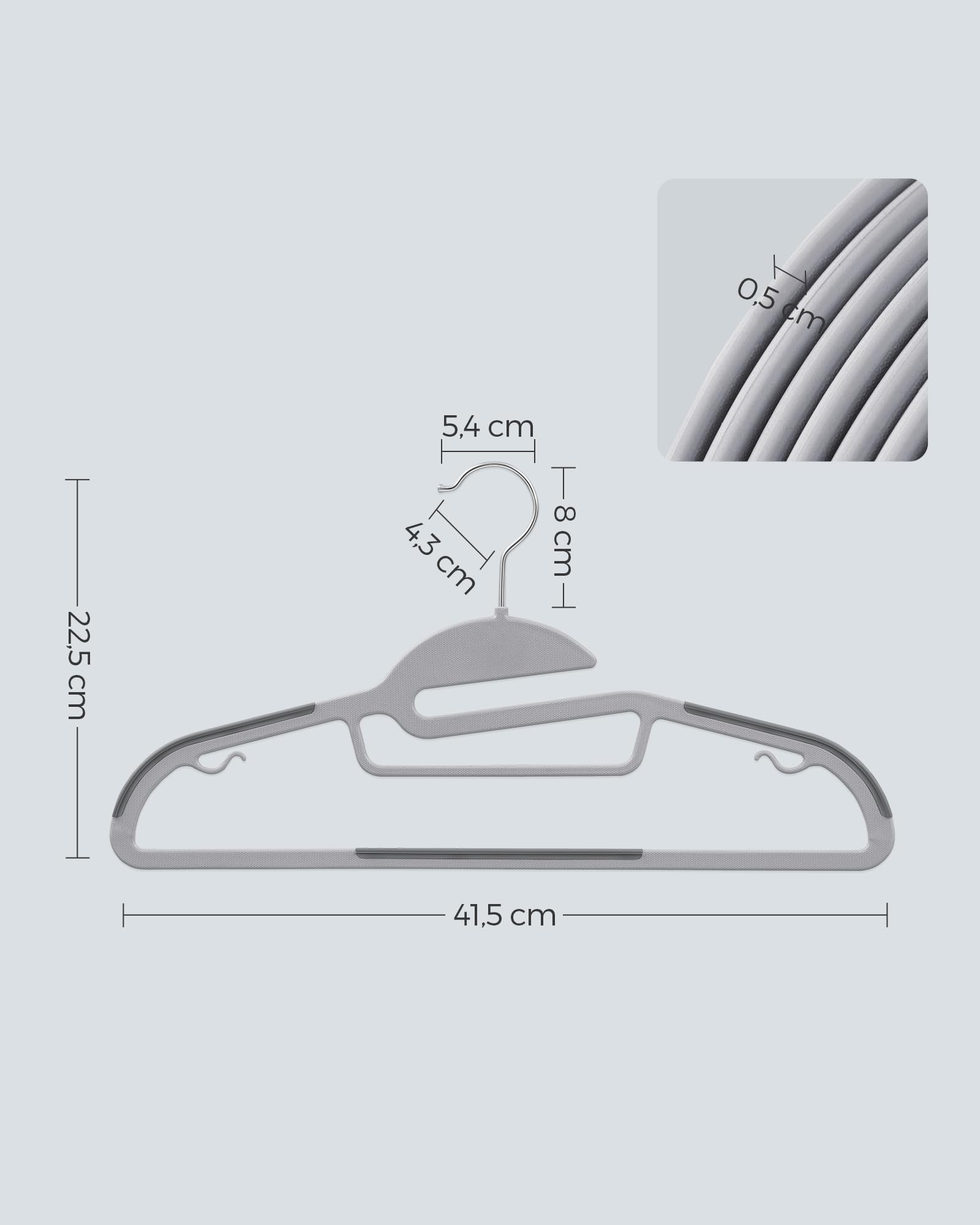 SONGMICS hanger thickness compared to ruler illustrating space-saving benefit