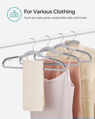 SONGMICS hangers in a styled wardrobe creating tidy, space-efficient closet