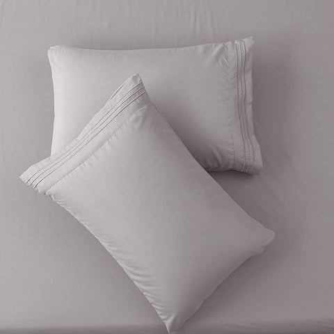 SONORO KATE embroidered edge detail adding elegant visual interest and polish