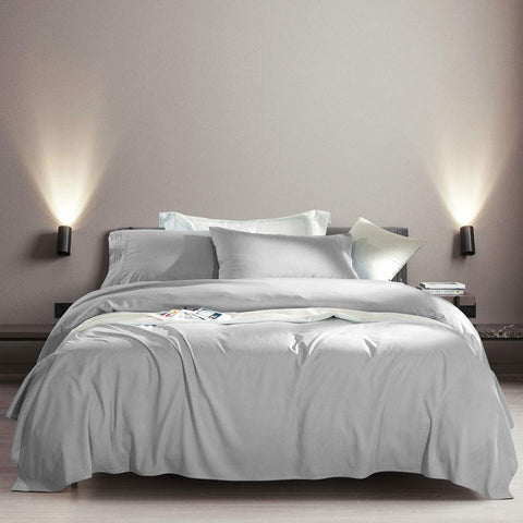 SONORO KATE flat sheet and four pillowcases laid flat showing full coverage and neat edges
