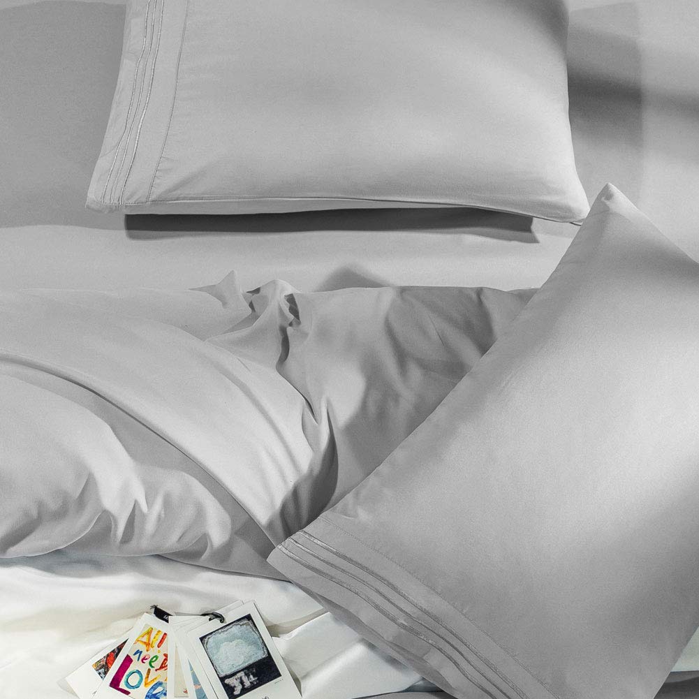 SONORO KATE styled bedroom with sheets on a made king bed conveying cozy elegance