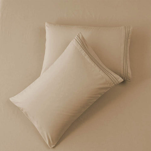SONORO KATE sheets on made bed showing polished bedroom look benefit