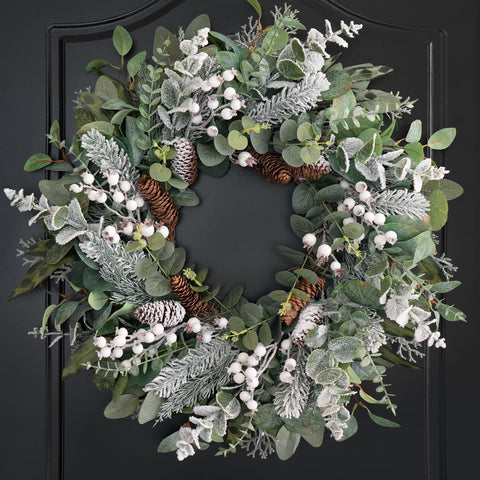 Soomeir front view wreath on door adds welcoming winter curb appeal