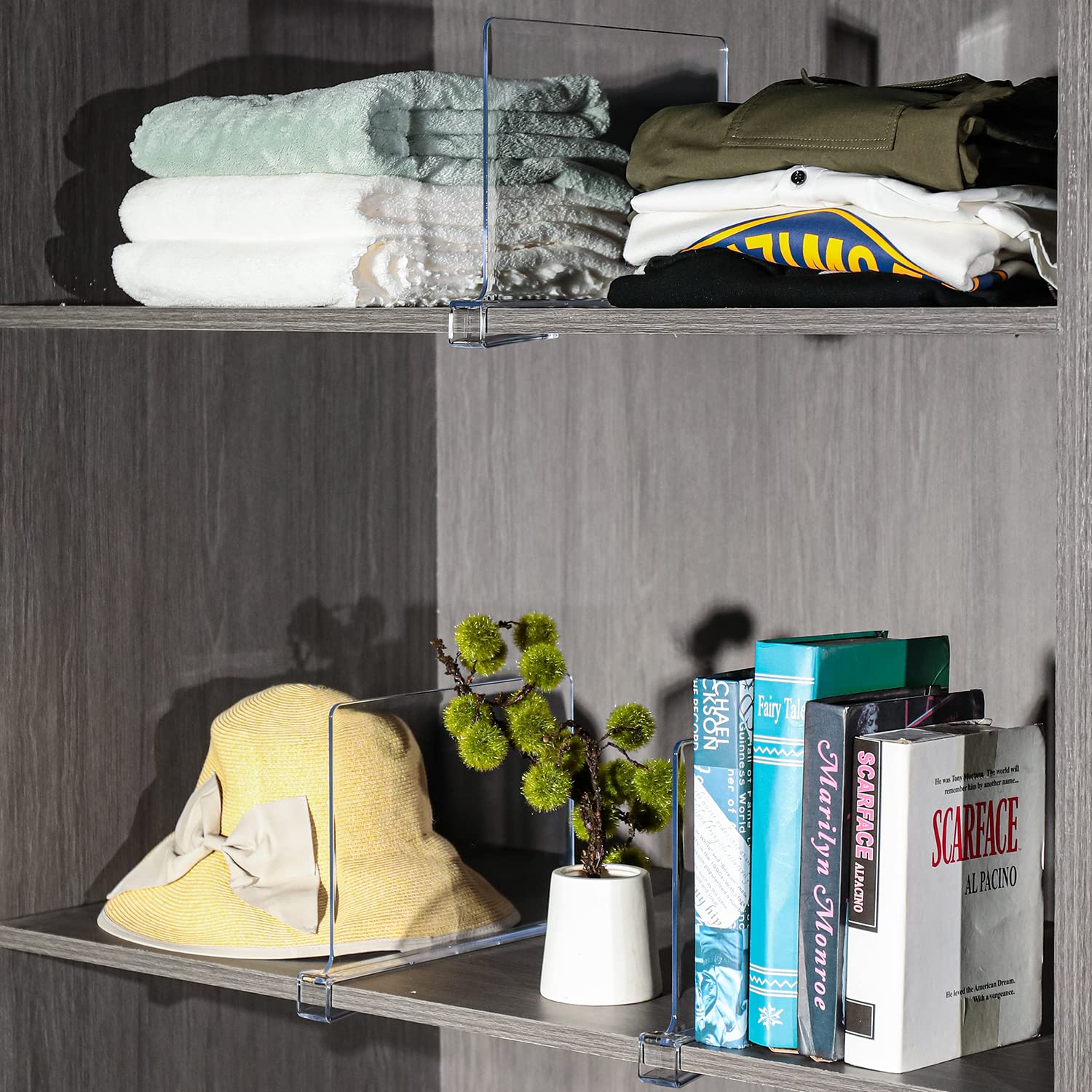 Sooyee divider next to a book to show scale and space-saving benefit