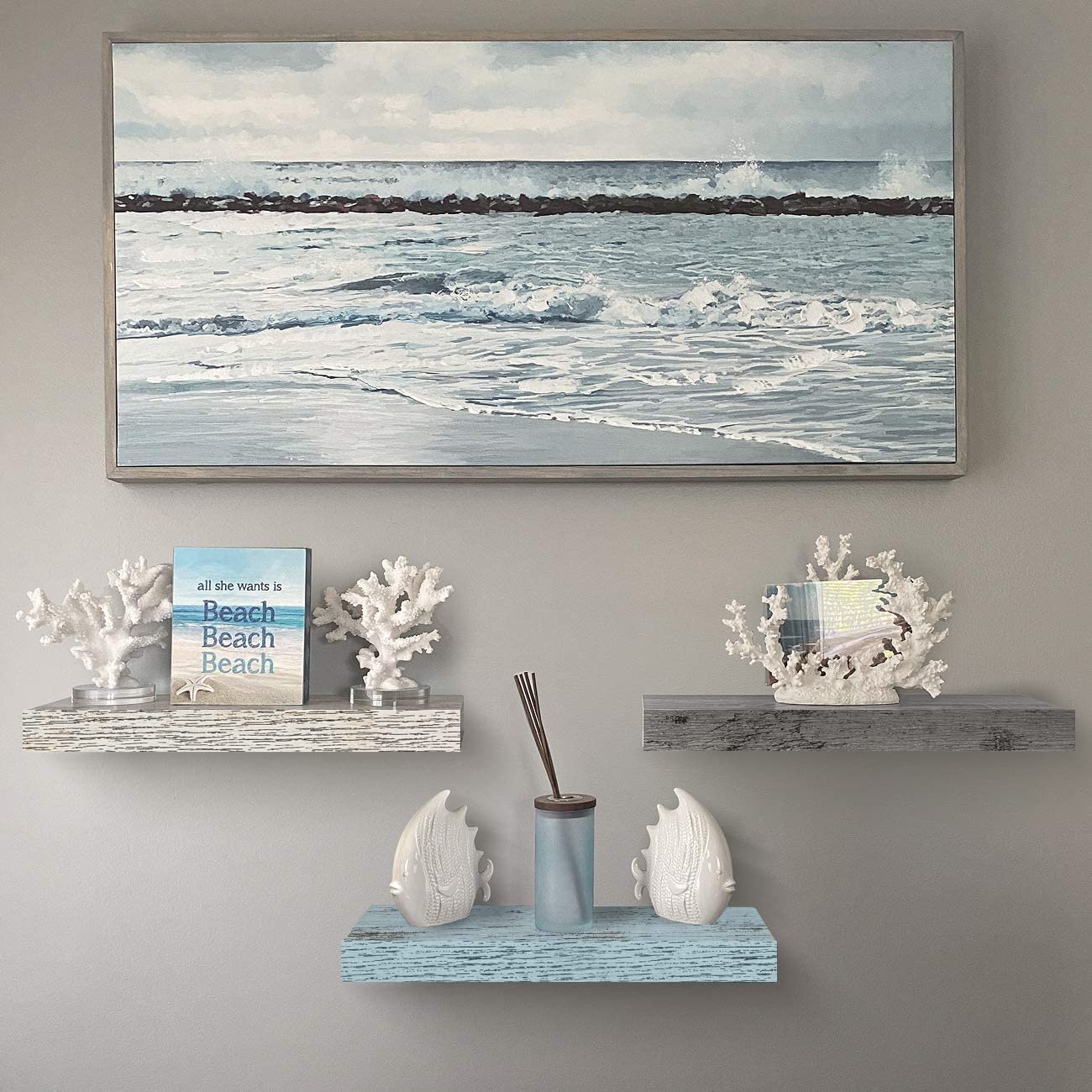 Sorbus staggered shelves used as gallery wall to display photos and plants