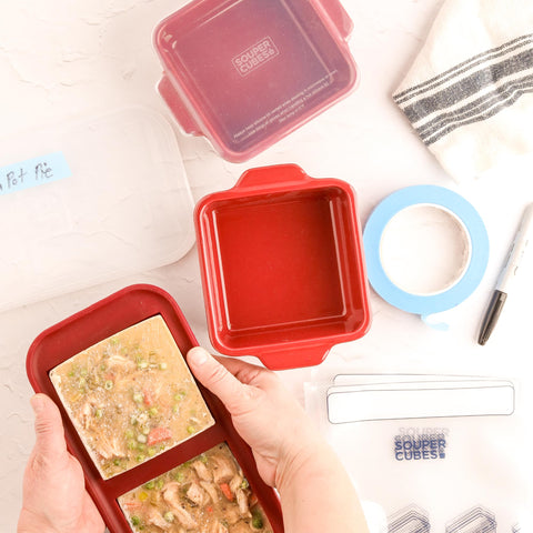 Souper Cubes dish beside a ruler for scale to show true 5x5 inch portion size benefit