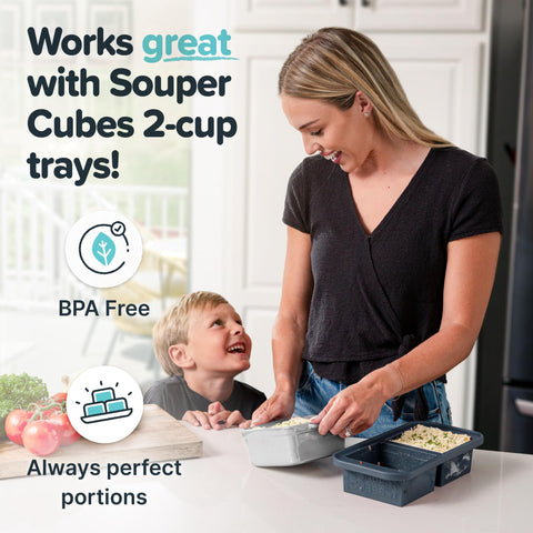 Souper Cubes dish held in hand for size comparison showing compact portion-friendly design