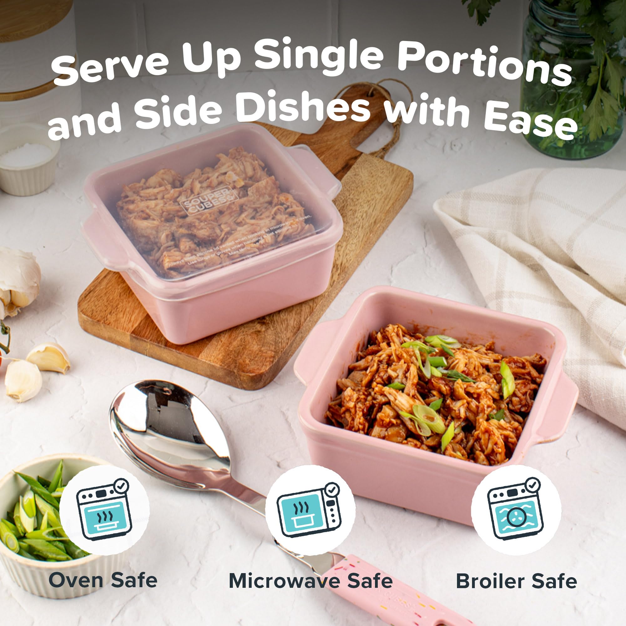 Souper Cubes stacked dishes in fridge beside hand for scale, space-saving benefit
