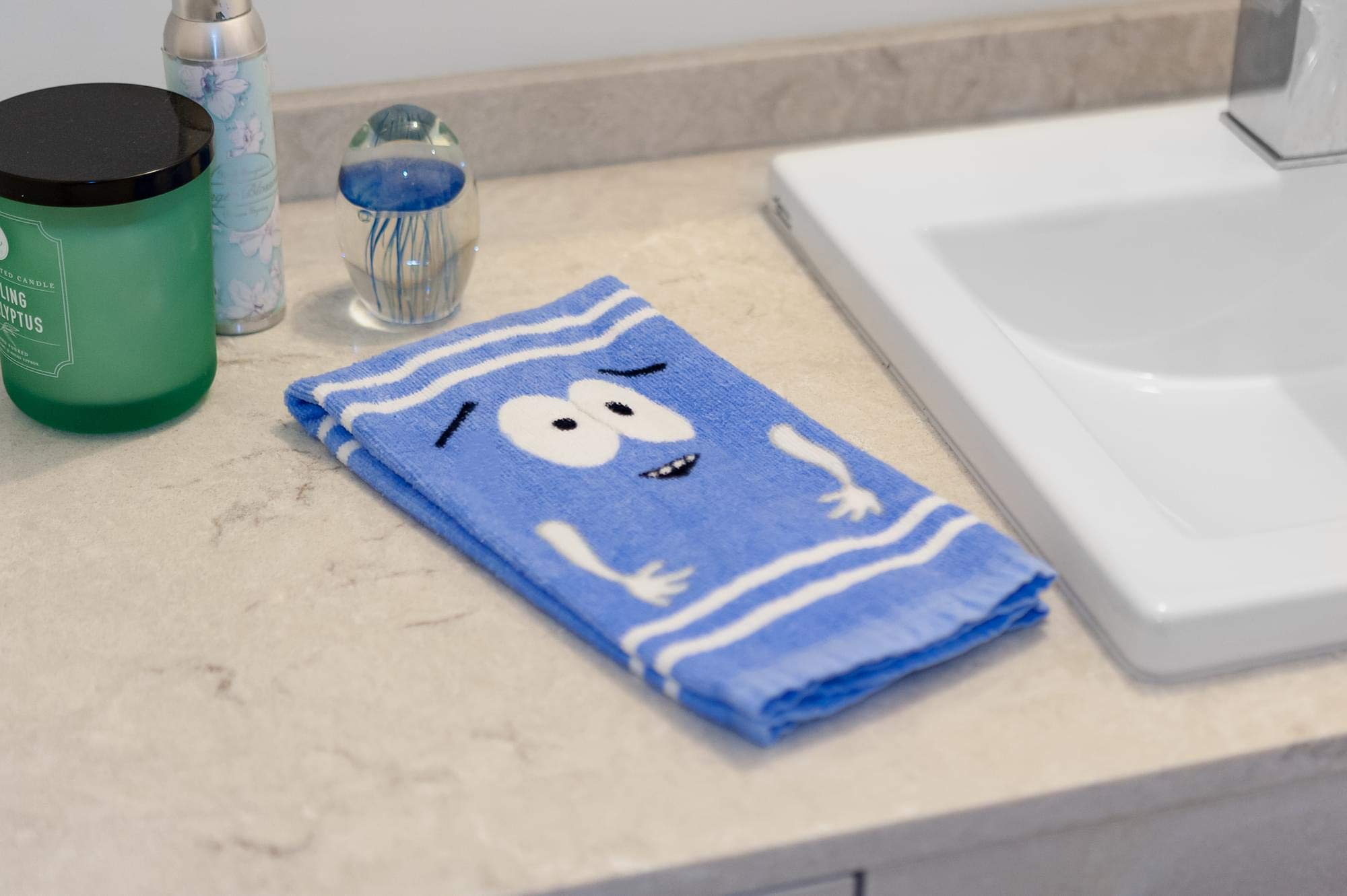 South Park Towelie hanging in bathroom, brand adds personality and keeps hands dry