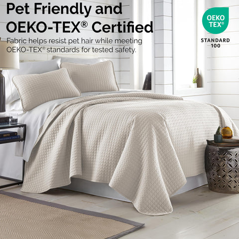 Southshore Fine Living quilt folded for storage showing easy-care, wrinkle-resistant fabric