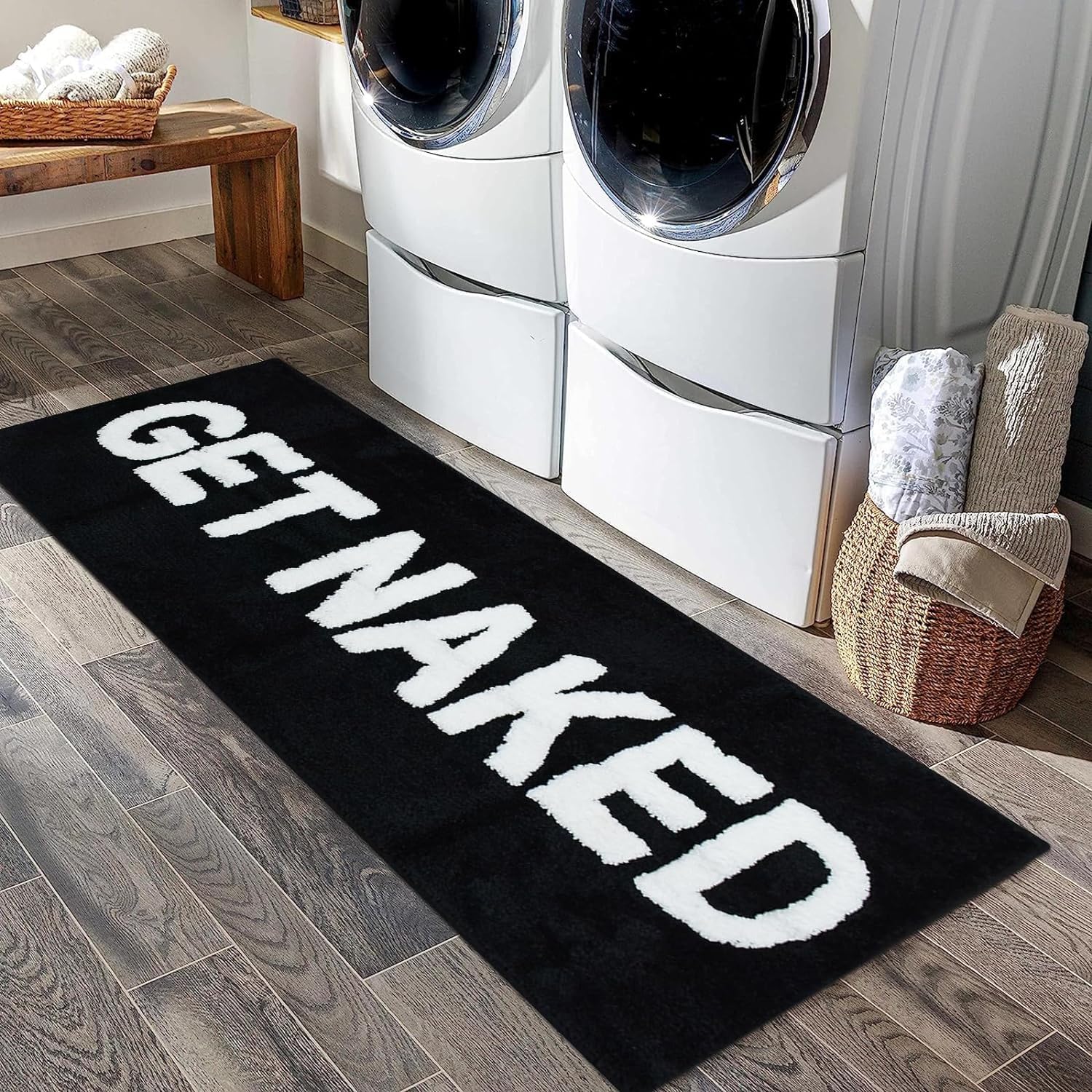 sovelor front view of black Get Naked bath mat showing design and fit