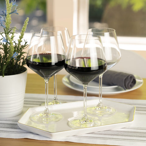 Spiegelau glass beside bottle showing 22.6 oz capacity for generous pours