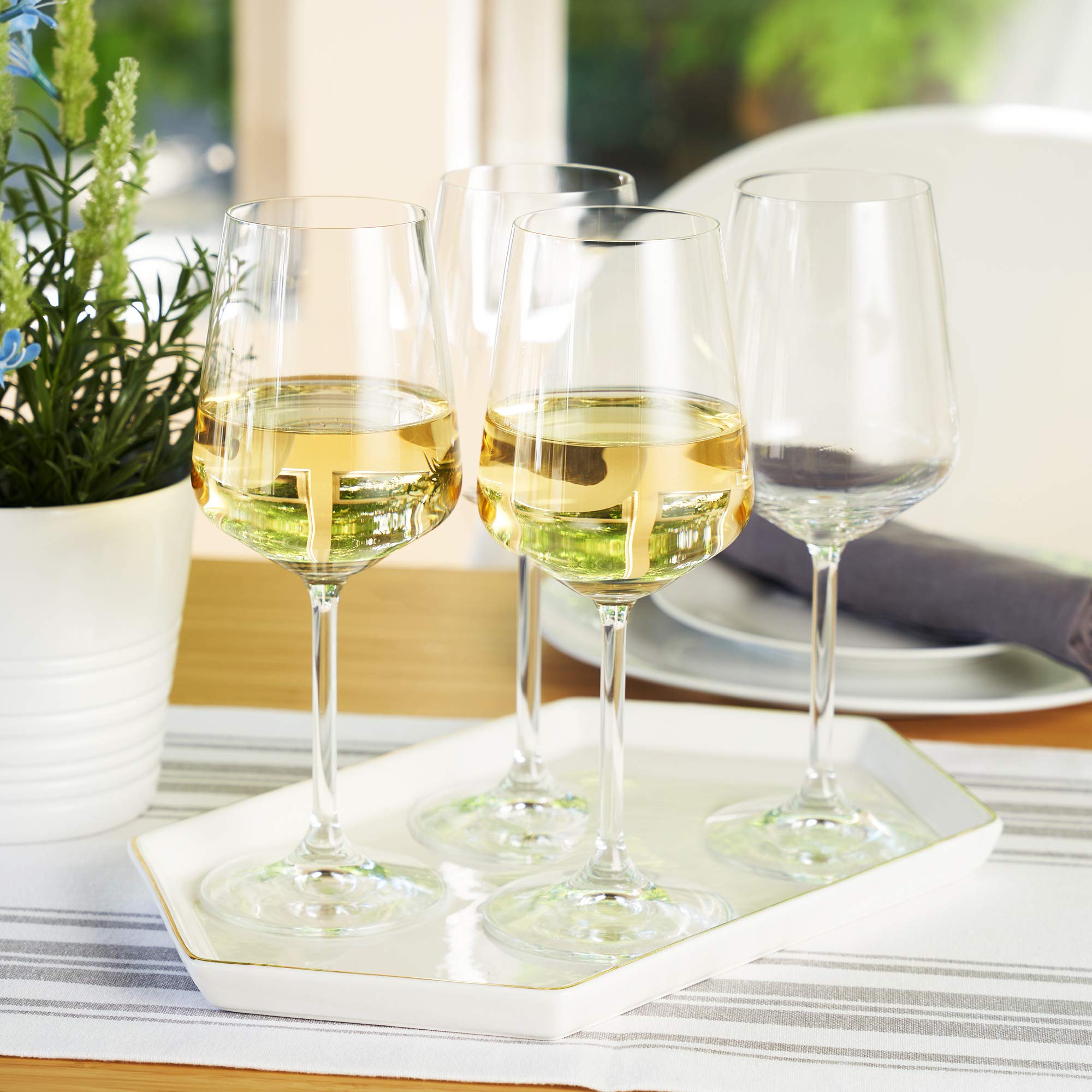 Spiegelau glasses styled on bar cart adding polished decor benefit