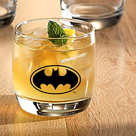 Spoontiques glasses on bar with cocktail illustrating stylish serving presentation